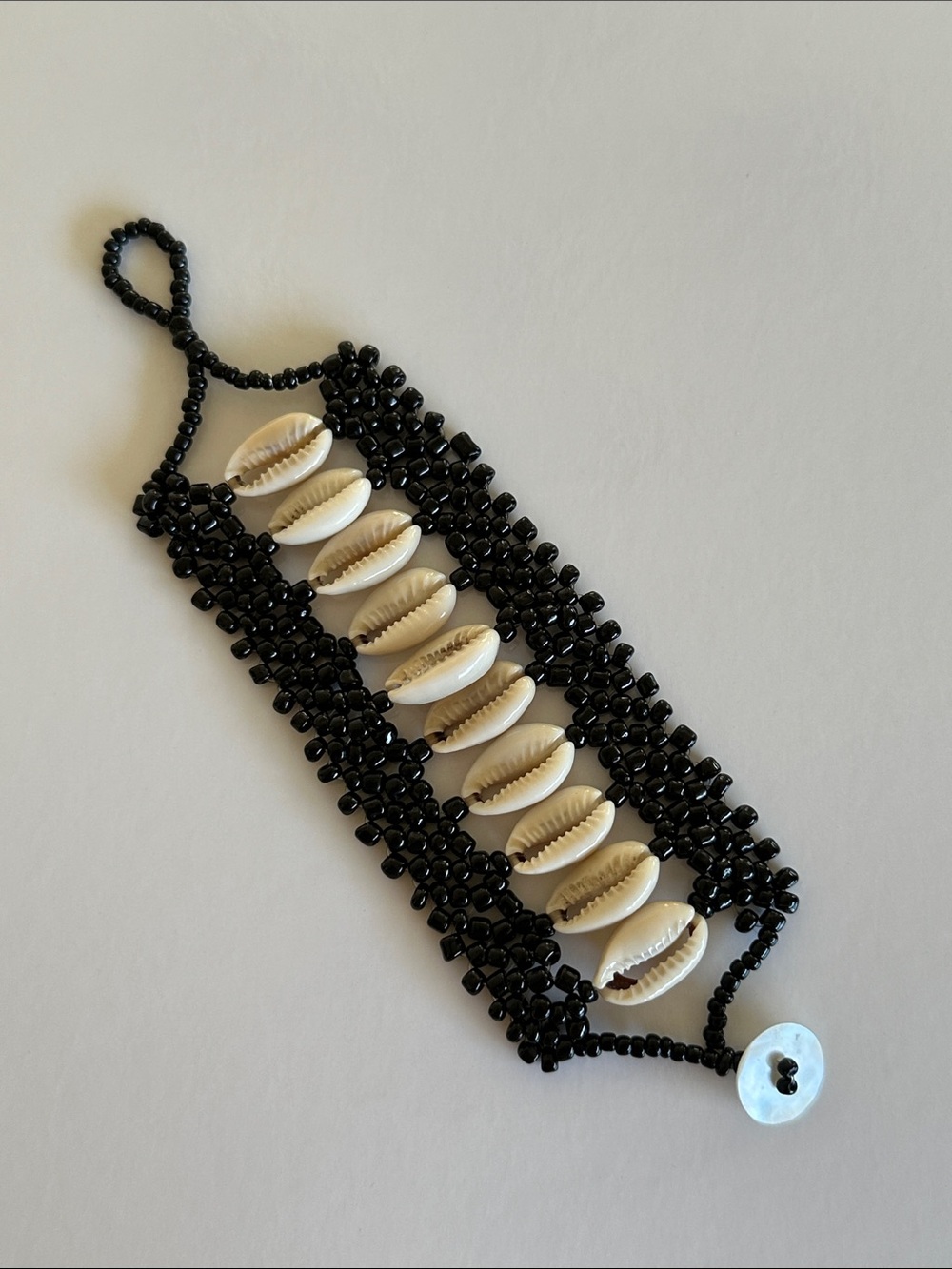 Handmade Black Beaded Bracelet with Natural Cowrie Shells